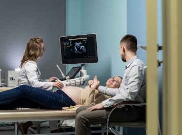 gynecologist-performing-ultrasound-consultation-min